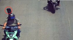 AI कैमरे की गलती: पीछे कोई और नहीं गिटार था, पिलियन का विदाउट हेलमेट चालान कट गया
