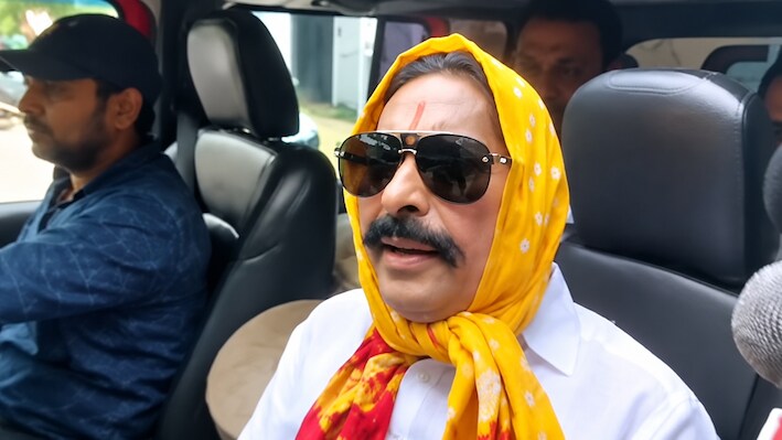 गमछे में थोड़ा और पीलापन होता तो जन सुराजी दिखते अनंत सिंह, काला चश्मा और सफेद कुर्ते में देखिए अलहदा अंदाज