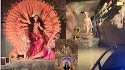 झरने के नीचे शिवलिंग, फन फैलाए नाग देवता: पानी में बना पहला फ्लोटिंग नागलोक थीम वाला पंडाल, नाव से दर्शन करने पहुंचे भक्त