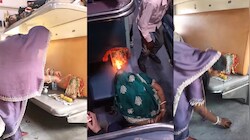 ट्रेन में सुलगाई अगरबत्ती, जलाया दीया और फोड़ा नारियल: चलती ट्रेन में पूजा का VIDEO वायरल; रेलवे के नियमों पर छिड़ी बहस
